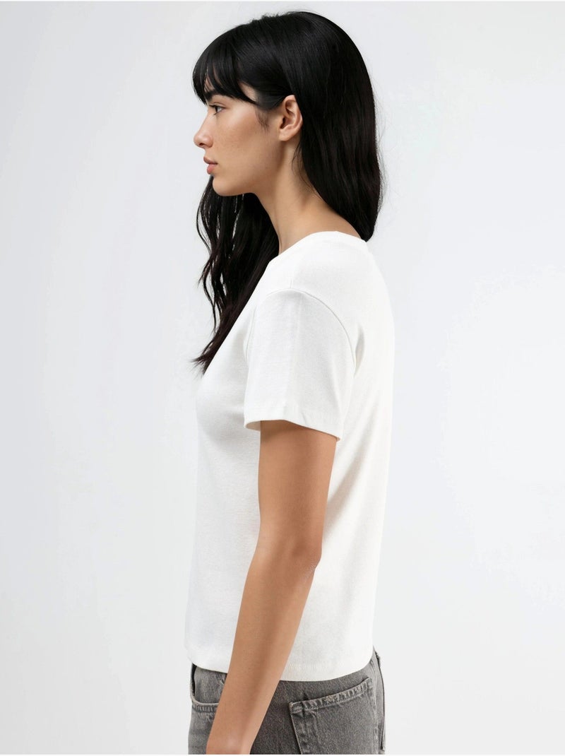 T-shirt girocollo con dettaglio in pietra busem Bianco - Kiabi