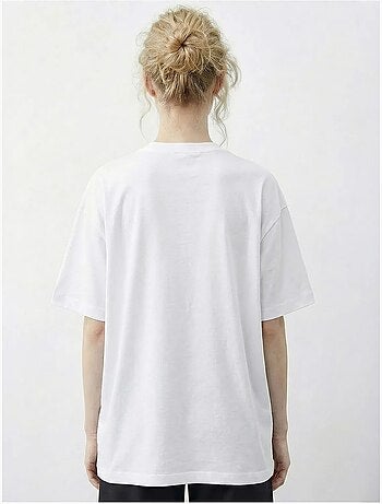 T-shirt girocollo con paillettes e stampa leopardata lucci