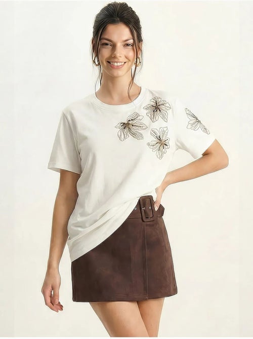 T-shirt girocollo con ricamo floreale lucci - Kiabi T-shirt girocollo con ricamo floreale lucci - Kiabi