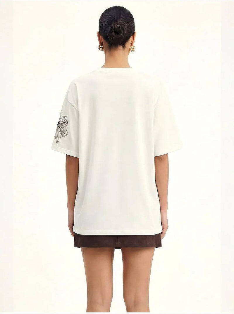 T-shirt girocollo con ricamo floreale lucci Bianco - Kiabi
