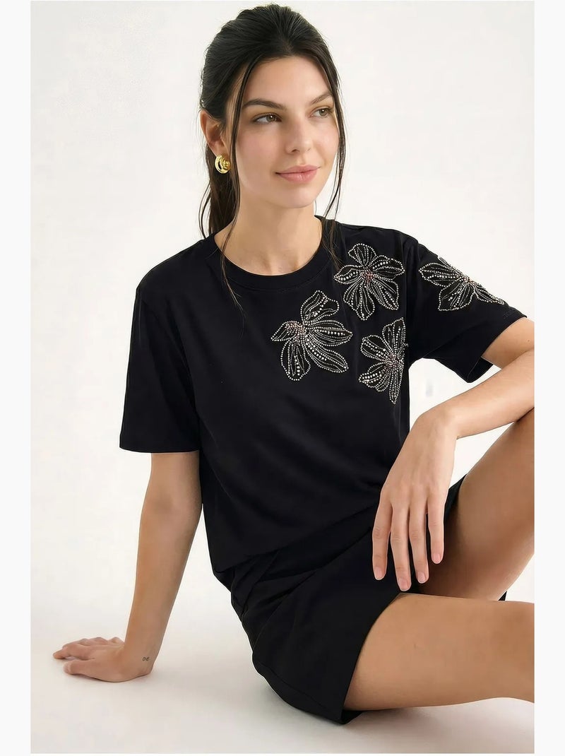 T-shirt girocollo con ricamo floreale lucci Nero - Kiabi