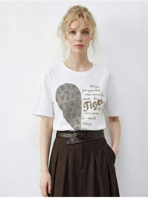 T-shirt girocollo con stampa di paillettes e testo lucci - Kiabi T-shirt girocollo con stampa di paillettes e testo lucci - Kiabi