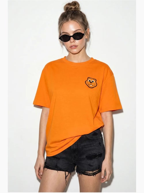 T-shirt girocollo in cotone pettinato oversize con ricamo lucci - Kiabi T-shirt girocollo in cotone pettinato oversize con ricamo lucci - Kiabi
