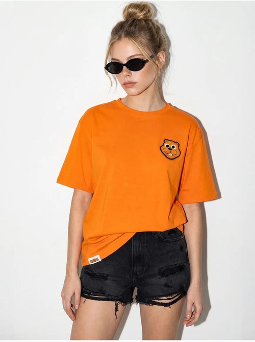 T-shirt girocollo in cotone pettinato oversize con ricamo lucci - Kiabi T-shirt girocollo in cotone pettinato oversize con ricamo lucci - Kiabi