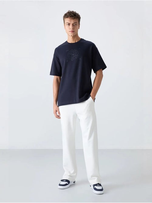 T-shirt girocollo oversize in misto cotone tommy - Kiabi T-shirt girocollo oversize in misto cotone tommy - Kiabi