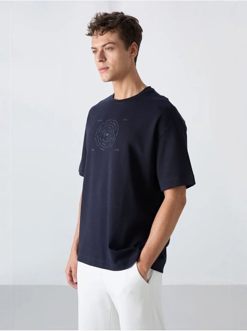 T-shirt girocollo oversize in misto cotone tommy - Kiabi T-shirt girocollo oversize in misto cotone tommy - Kiabi