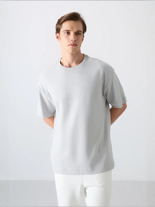 T-shirt girocollo oversize in misto cotone tommy - Kiabi
