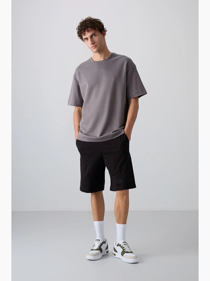 T-shirt girocollo oversize in misto cotone tommy Grigio nero - Kiabi