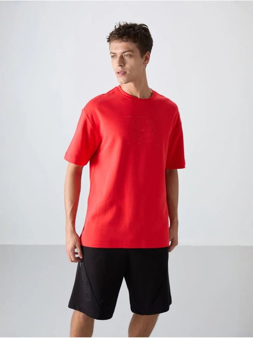 T-shirt girocollo oversize in misto cotone tommy - Kiabi T-shirt girocollo oversize in misto cotone tommy - Kiabi