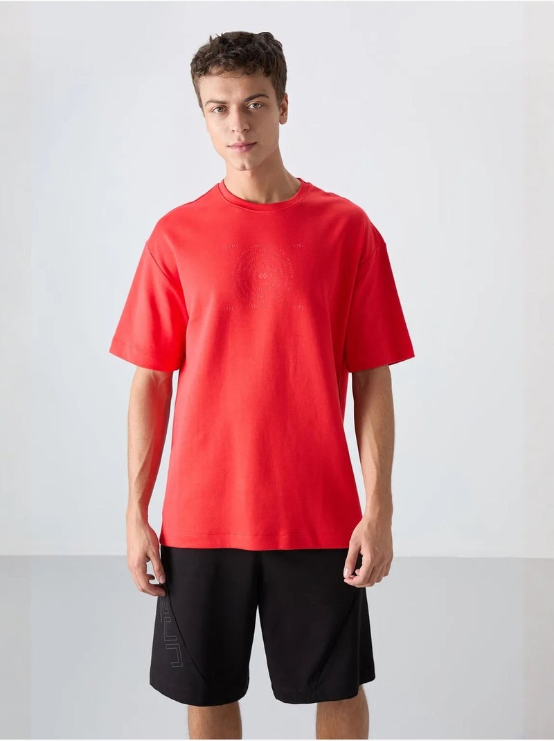 T-shirt girocollo oversize in misto cotone tommy Rosso - Kiabi