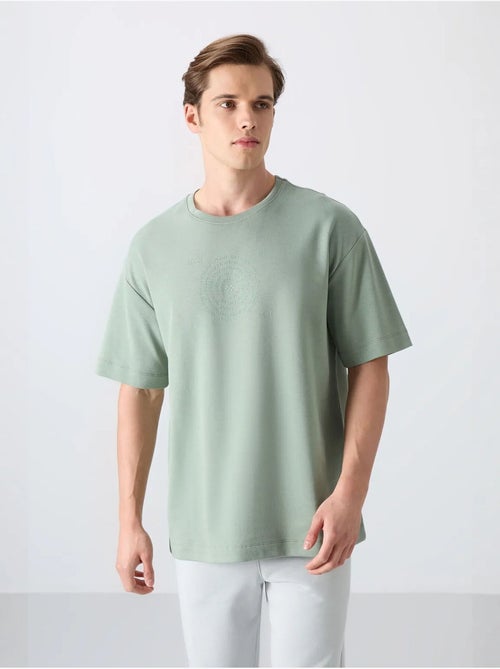 T-shirt girocollo oversize in misto cotone tommy - Kiabi T-shirt girocollo oversize in misto cotone tommy - Kiabi