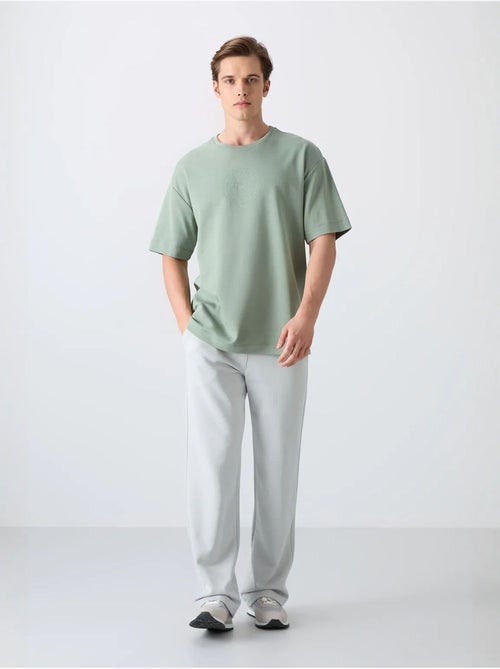 T-shirt girocollo oversize in misto cotone tommy - Kiabi T-shirt girocollo oversize in misto cotone tommy - Kiabi