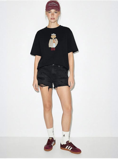 T-shirt girocollo ricamata dalla vestibilità rilassata lucci - Kiabi T-shirt girocollo ricamata dalla vestibilità rilassata lucci - Kiabi