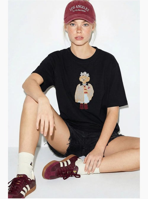 T-shirt girocollo ricamata dalla vestibilità rilassata lucci - Kiabi T-shirt girocollo ricamata dalla vestibilità rilassata lucci - Kiabi