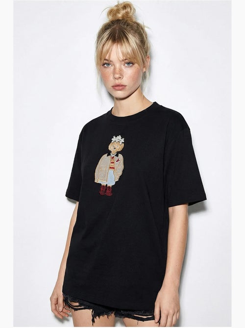 T-shirt girocollo ricamata dalla vestibilità rilassata lucci - Kiabi T-shirt girocollo ricamata dalla vestibilità rilassata lucci - Kiabi