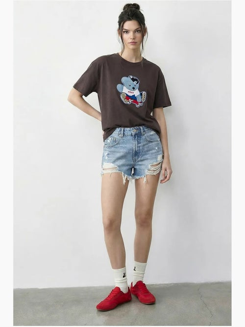 T-shirt girocollo ricamata lucci - Kiabi