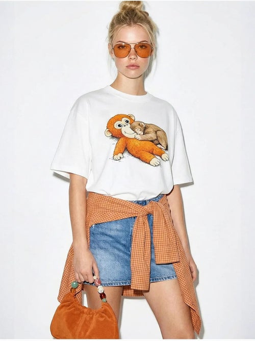 T-shirt girocollo stampata con dettaglio accessorio lucci - Kiabi T-shirt girocollo stampata con dettaglio accessorio lucci - Kiabi