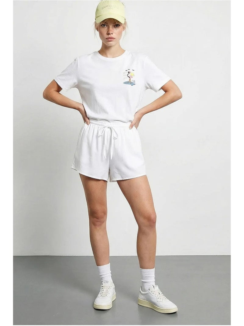 T-shirt in cotone con girocollo ricamata lucci Bianco - Kiabi