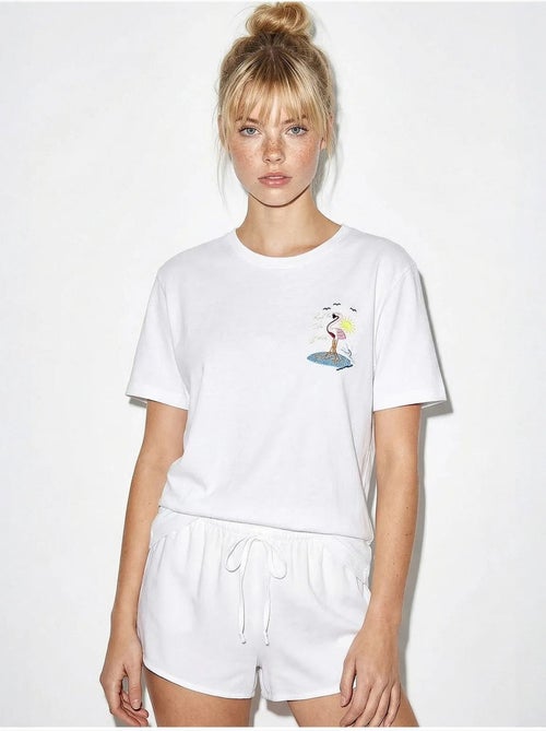 T-shirt in cotone con girocollo ricamata lucci - Kiabi T-shirt in cotone con girocollo ricamata lucci - Kiabi