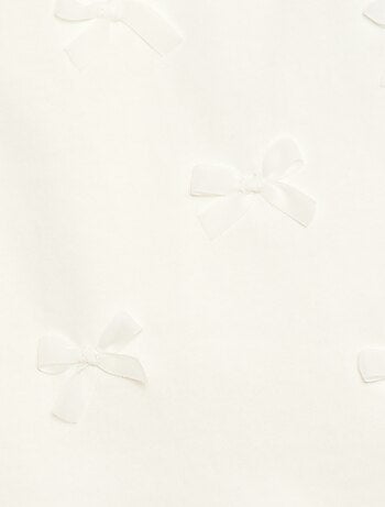 T-shirt in jersey a maniche corte con fiocchi decorativi