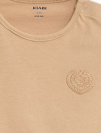 T-shirt in jersey con apertura con bottoni a pressione sulla spalla -