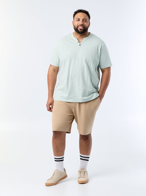 T-shirt in jersey con collo alla tunisina e maniche corte - Kiabi T-shirt in jersey con collo alla tunisina e maniche corte - Kiabi