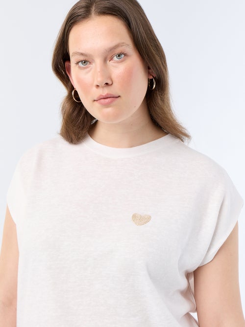 T-shirt in jersey senza maniche con piccolo ricamo sul petto - Kiabi