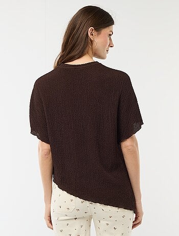 T-shirt in maglia con base asimmetrica