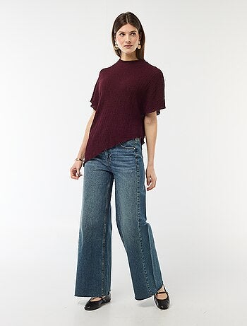 T-shirt in maglia con base asimmetrica