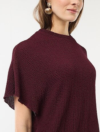 T-shirt in maglia con base asimmetrica