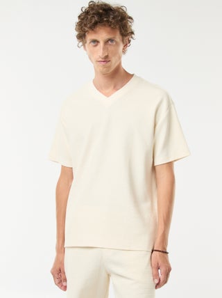 T-shirt in maglia con scollo a V