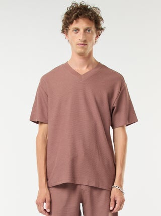 T-shirt in maglia con scollo a V