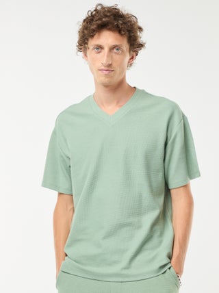 T-shirt in maglia con scollo a V