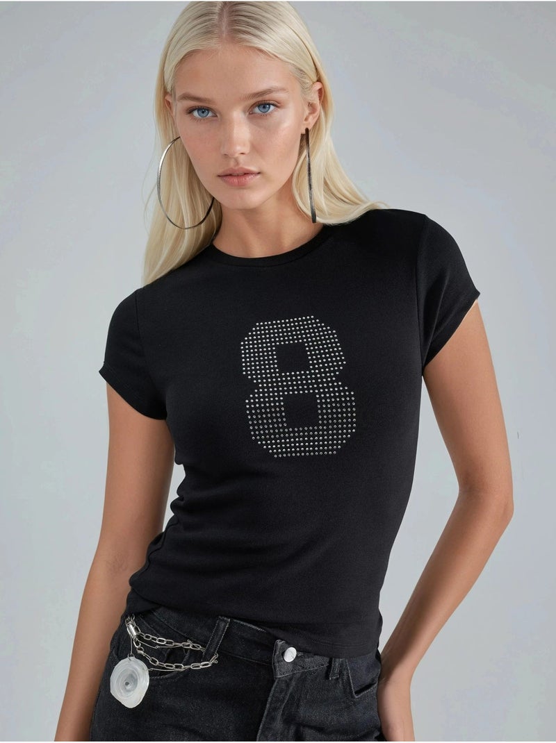 T-shirt in maglia elasticizzata a maniche corte con dettaglio in pietra busem Nero - Kiabi