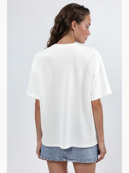 T-shirt in maglia oversize con girocollo effetto modal hiccup - Kiabi T-shirt in maglia oversize con girocollo effetto modal hiccup - Kiabi