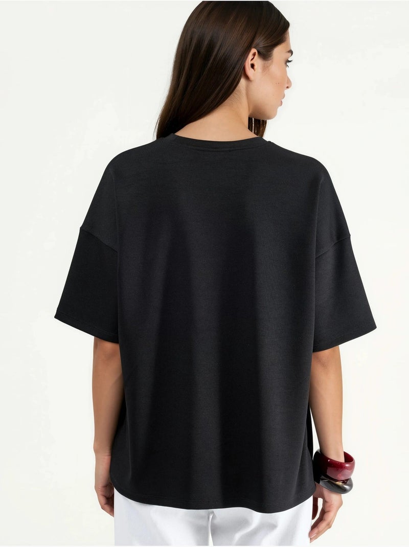 T-shirt in maglia oversize con girocollo effetto modal hiccup Nero - Kiabi