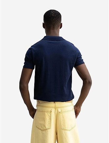 T-shirt in maglia tinta unita con colletto polo giesto