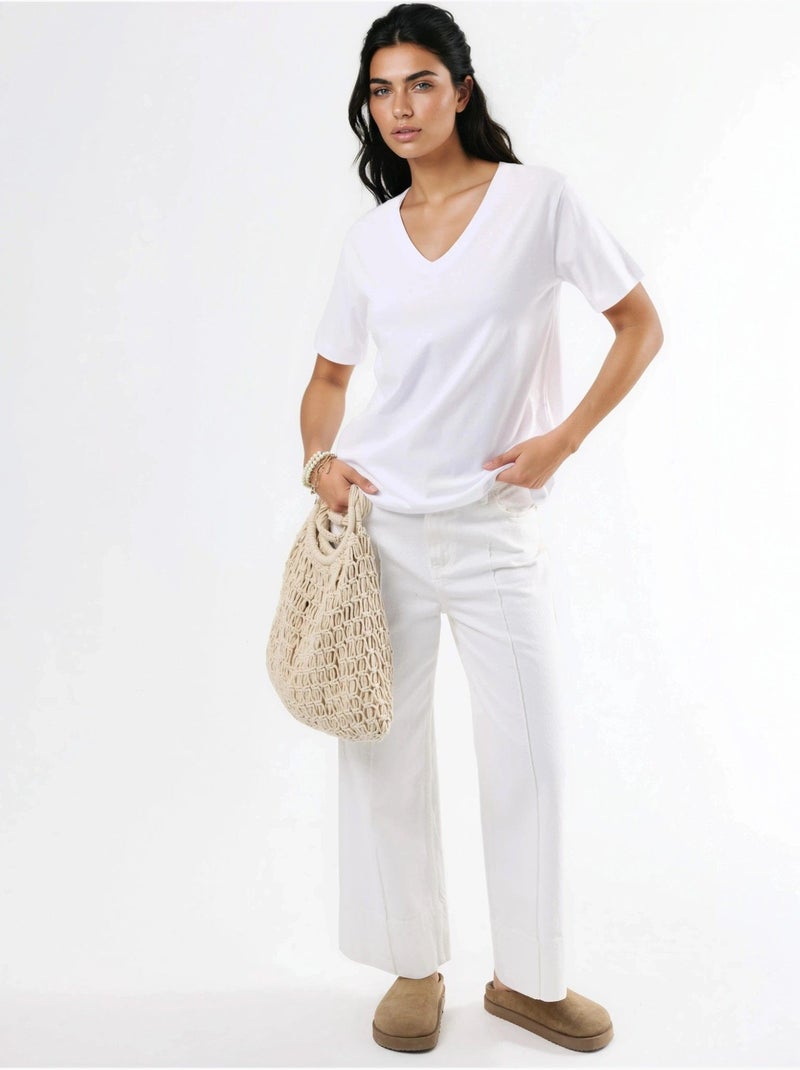 T-shirt in maglia tinta unita con scollo a v busem Bianco - Kiabi