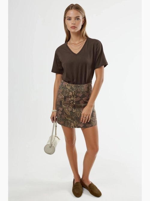 T-shirt in maglia tinta unita con scollo a v busem - Kiabi T-shirt in maglia tinta unita con scollo a v busem - Kiabi