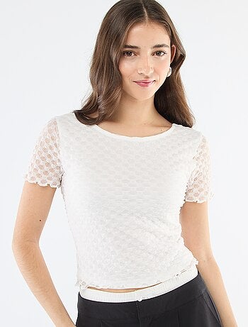 T-shirt in pizzo con schiena scoperta