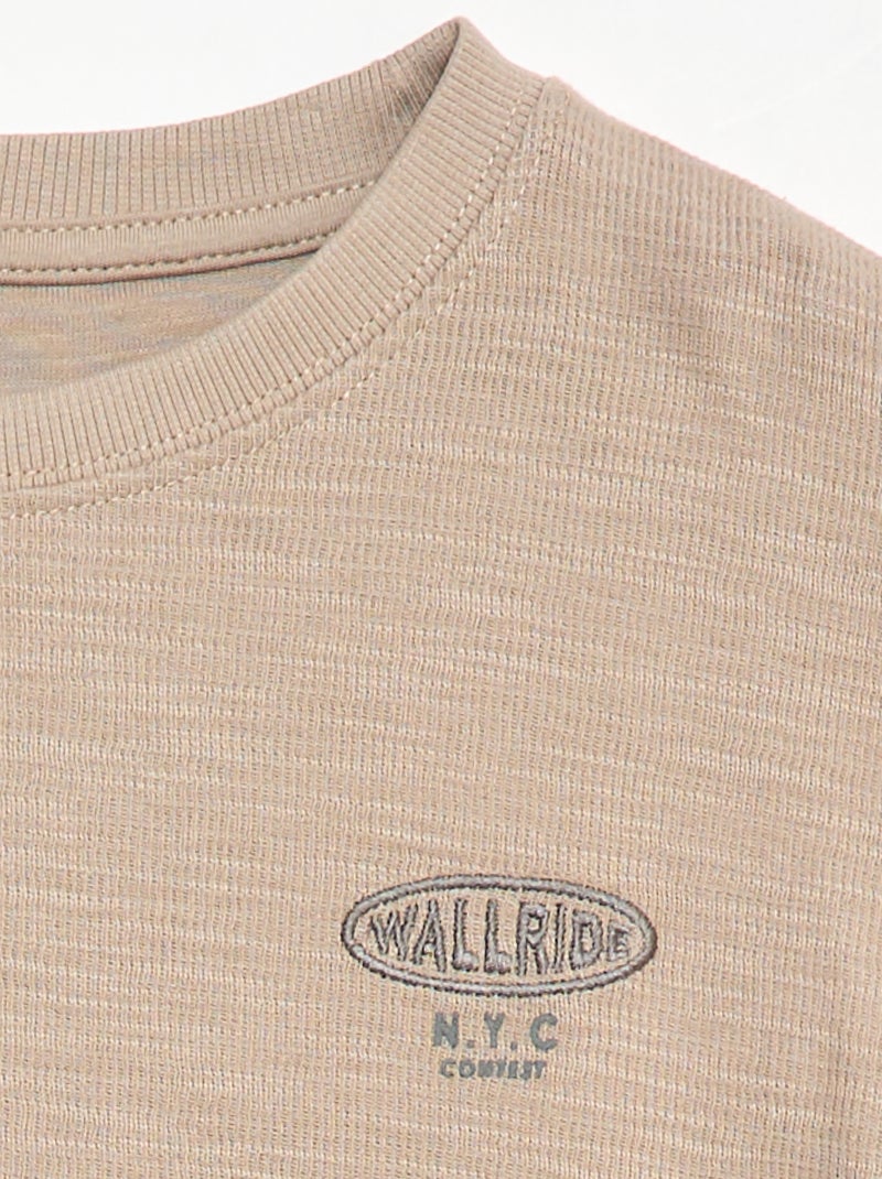T-shirt in tessuto con ricamo Beige - Kiabi