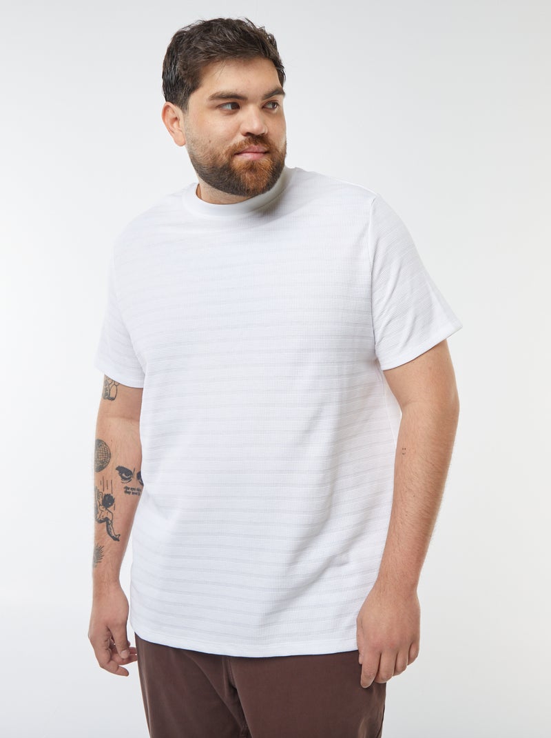 T-shirt in tessuto fantasia con maniche corte bianco - Kiabi