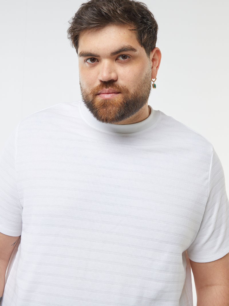 T-shirt in tessuto fantasia con maniche corte bianco - Kiabi