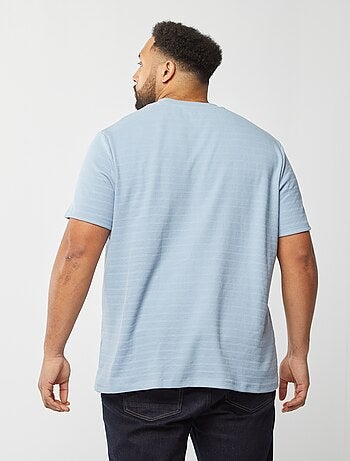 T-shirt in tessuto fantasia con maniche corte