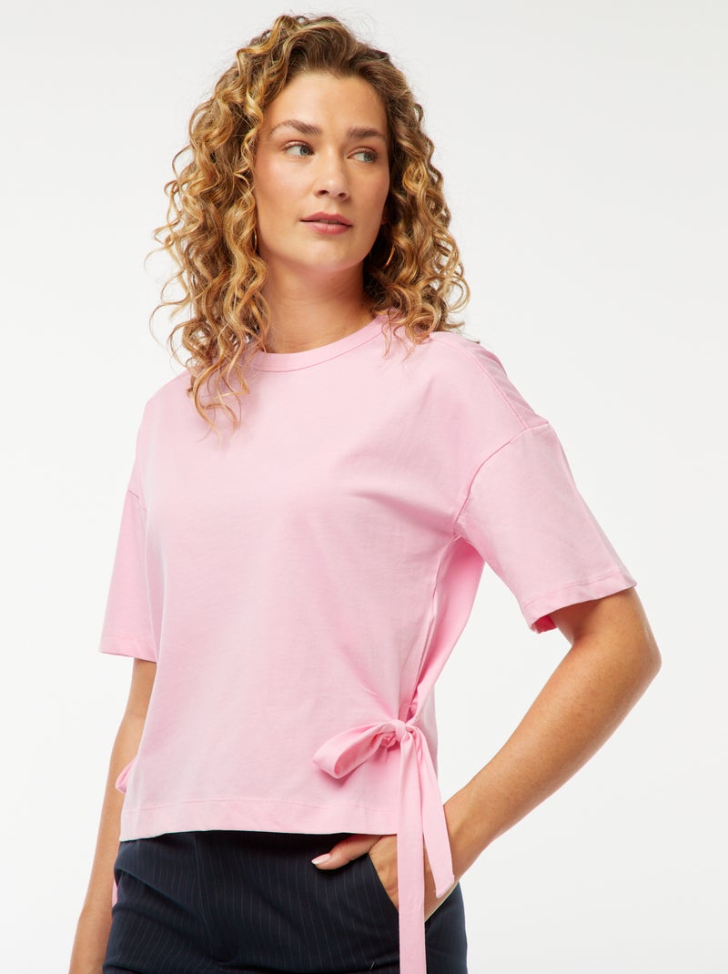 T-shirt larga con fiocchi rosa - Kiabi