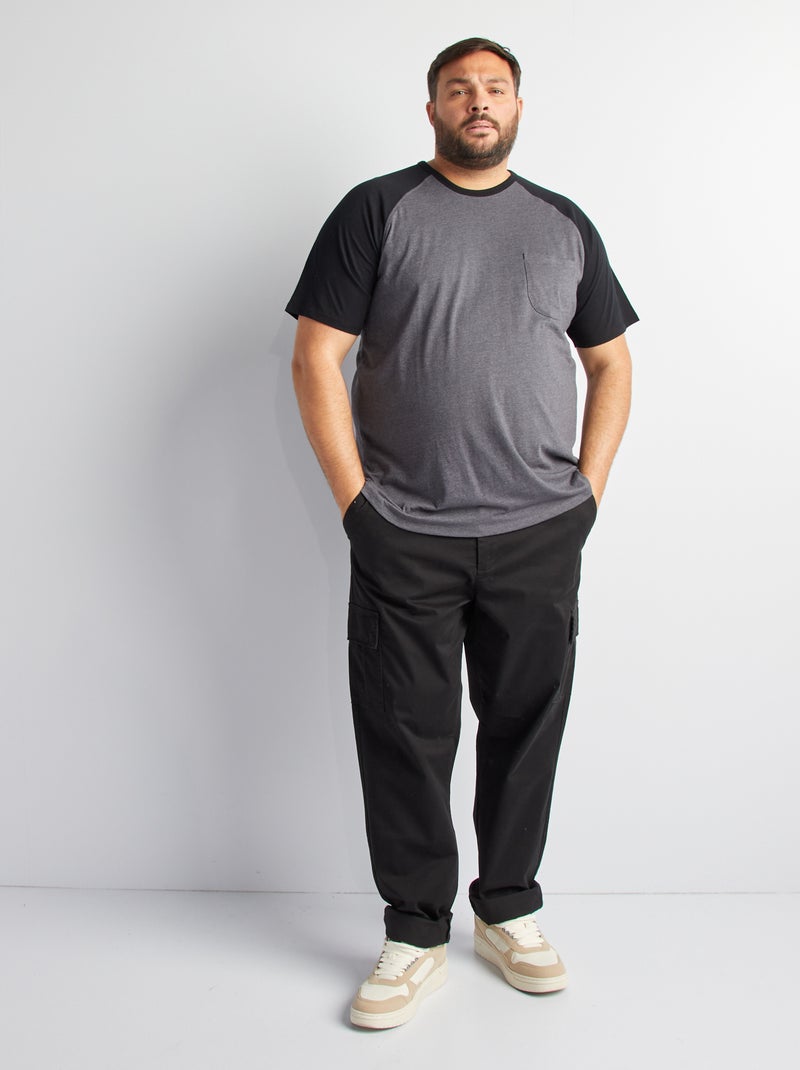 T-shirt maniche corte raglan con tasca sul petto NERO - Kiabi