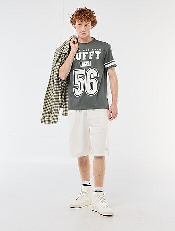 T-shirt 'One Piece' in cotone tinta unita con righe sulle maniche