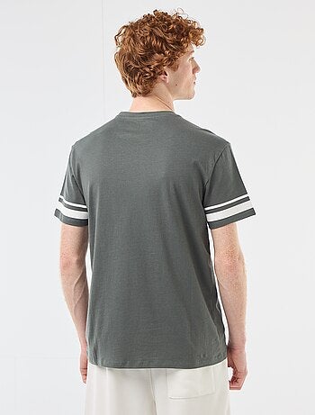 T-shirt 'One Piece' in cotone tinta unita con righe sulle maniche