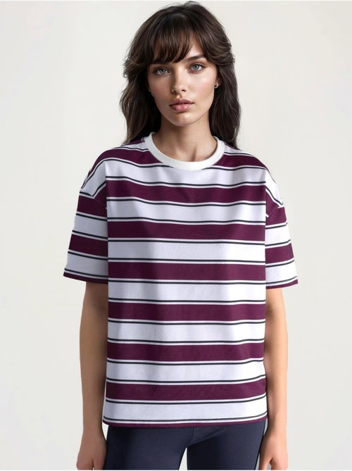 T-shirt oversize a righe con girocollo hiccup - Kiabi T-shirt oversize a righe con girocollo hiccup - Kiabi