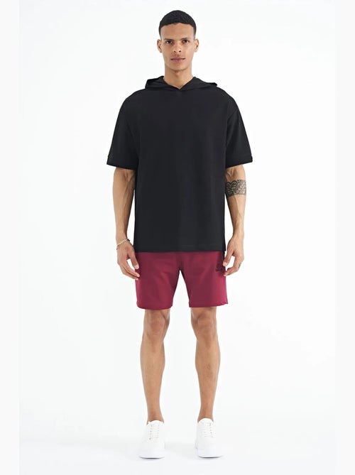 T-shirt oversize con cappuccio e maniche corte tommy - Kiabi